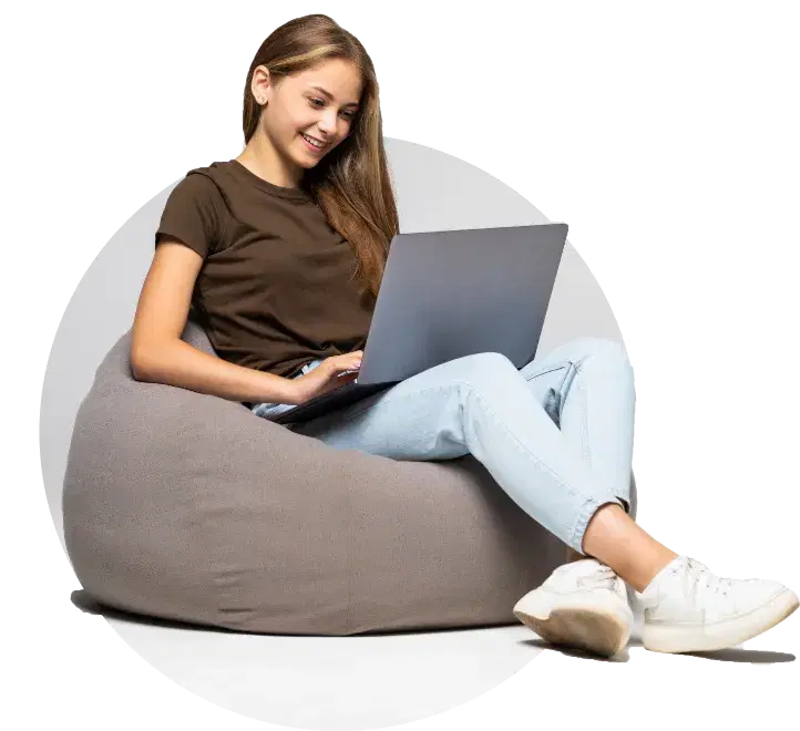 A happy young woman who runs a paid membership community