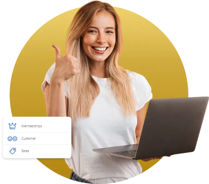 A creator managing her membership site on a laptop