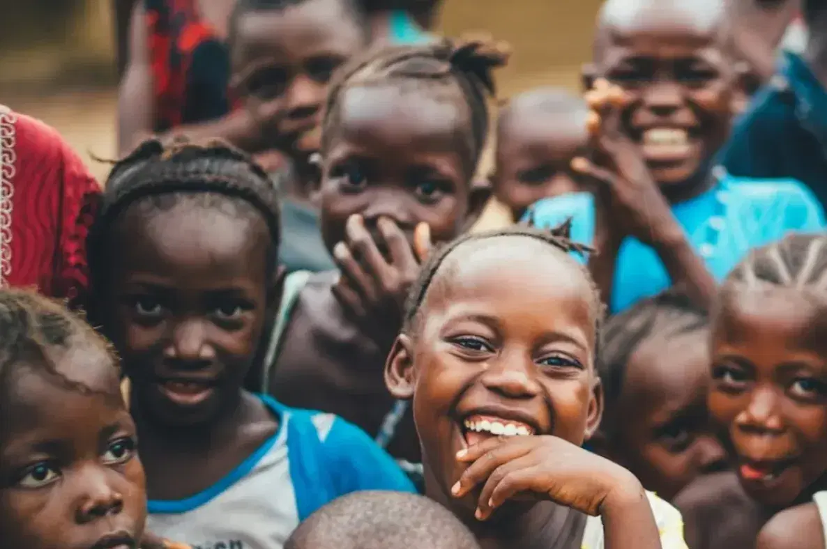 Smiling children in Africa supported by Vonza